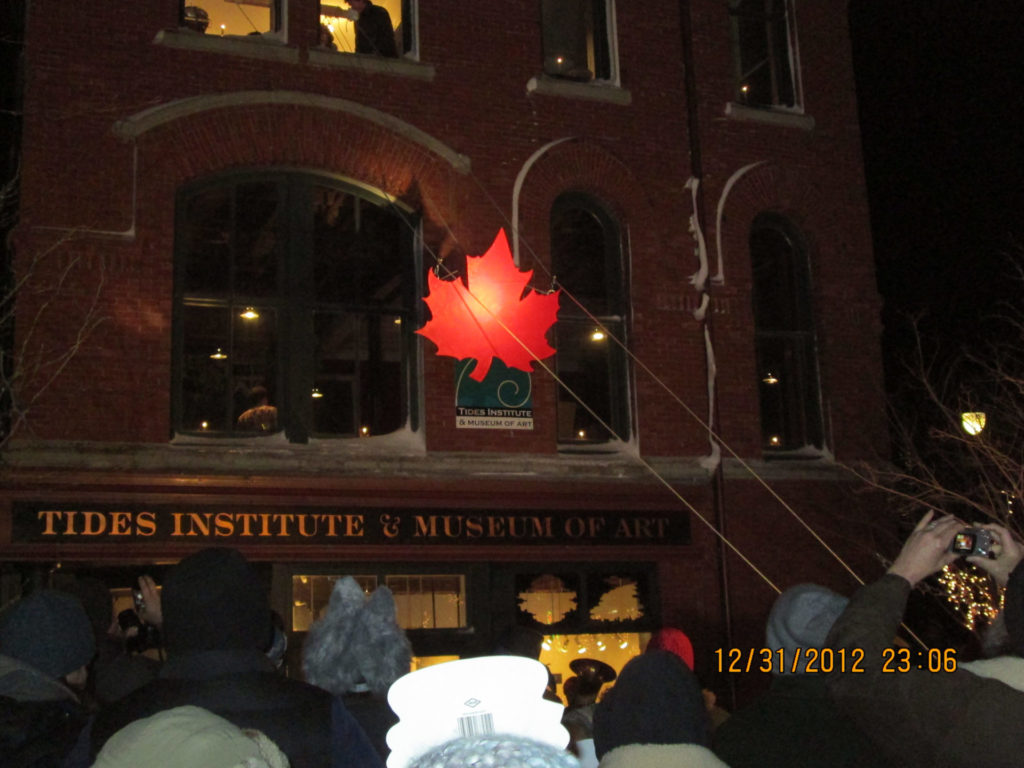 Maple Leaf lowered New Years Eve in Eastport Maine