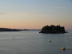 In the distance a cruise ship is docked in Eastport, ME, site of fireworks seen from Lubec,ME