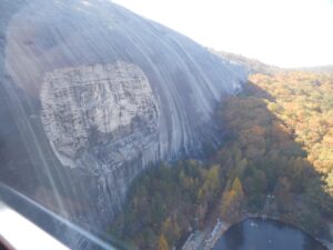 View of carving on side of Stone Mountain from cable car
