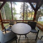 Table and chairs in waterview trailside screenhouse Lubec Maine
